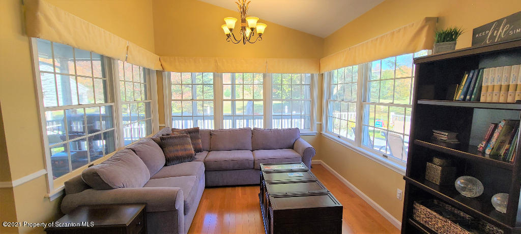 129 Bald Mountain Road Wilkes Barre, PA 18702 - Photo 13 of 40 a living room with furniture and a flat screen tv