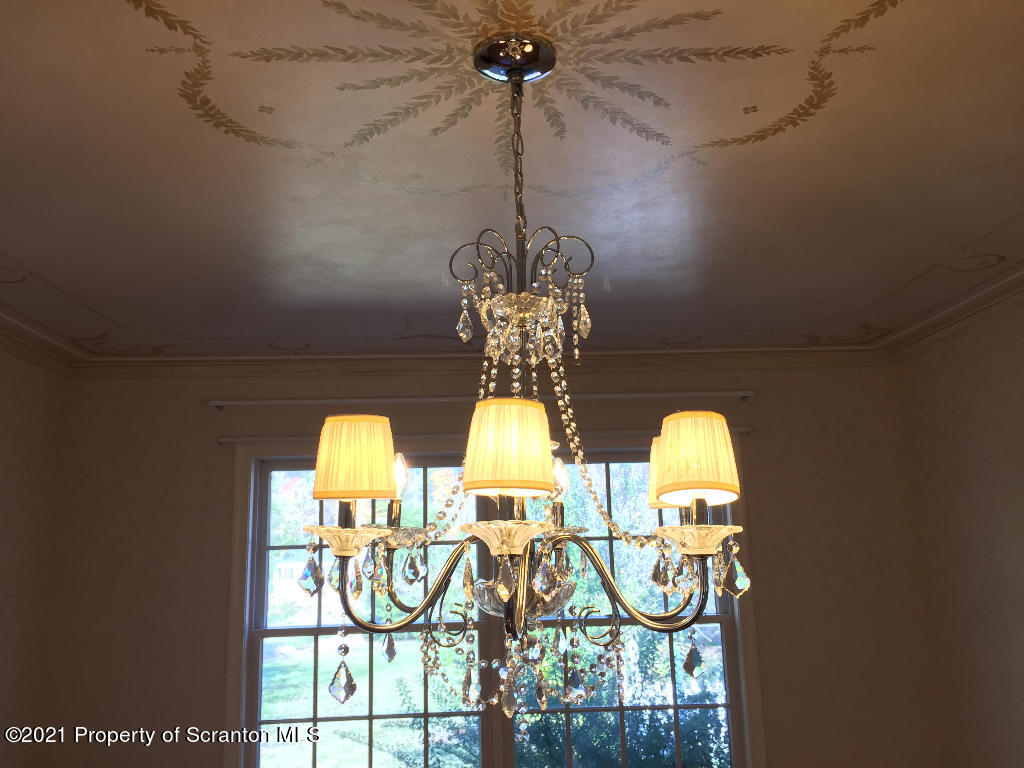 129 Bald Mountain Road Wilkes Barre, PA 18702 - Photo 16 of 40 a view of a chandelier in a hall with a chandelier