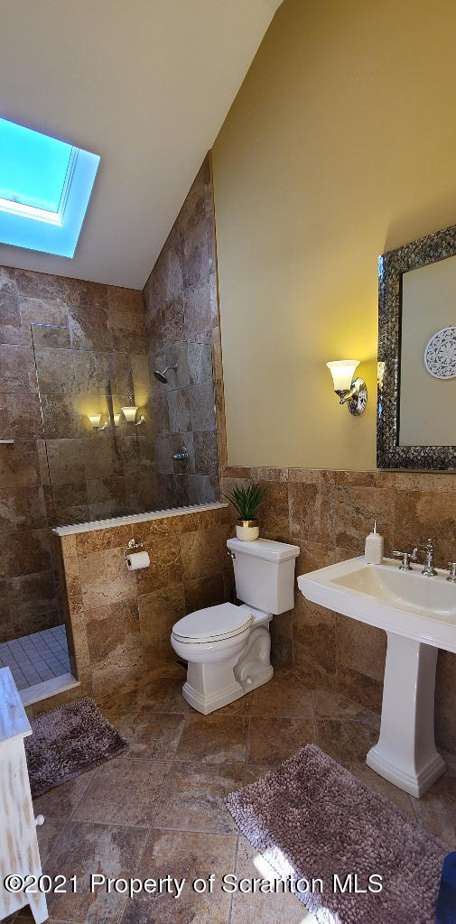 129 Bald Mountain Road Wilkes Barre, PA 18702 - Photo 20 of 40 a bathroom with a sink and a mirror