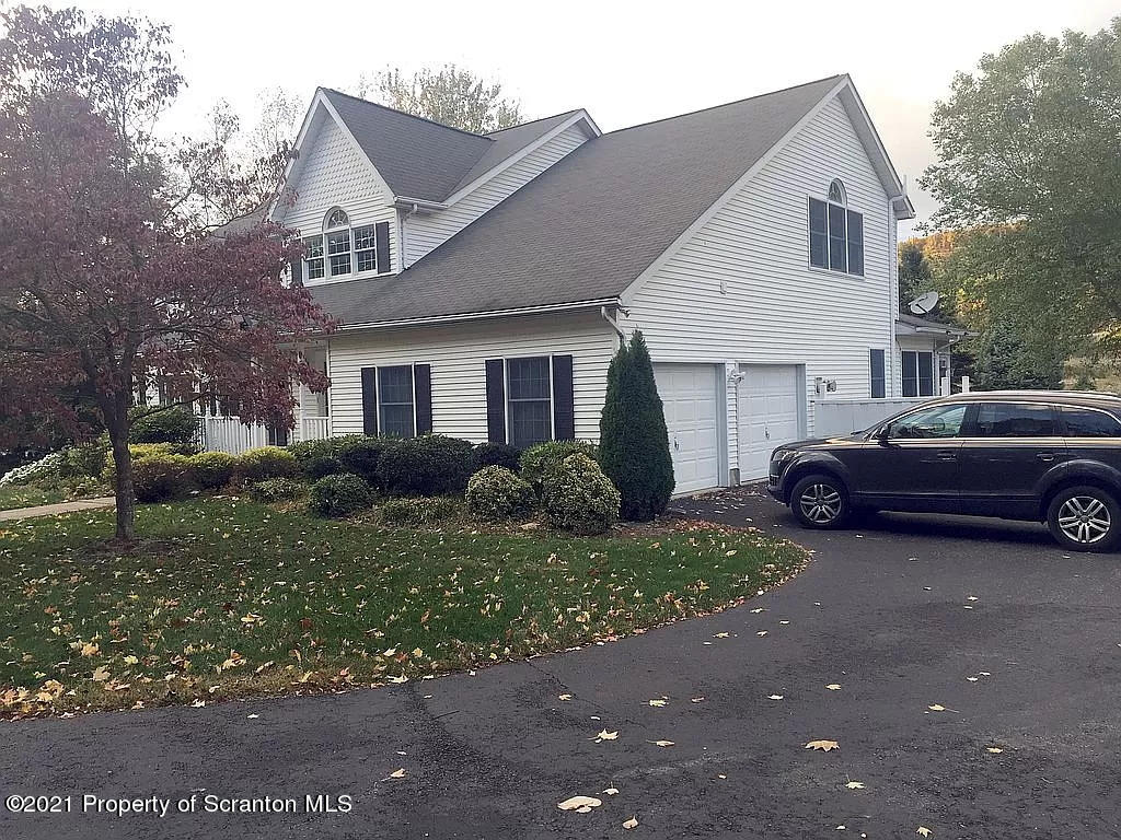 129 Bald Mountain Road Wilkes Barre, PA 18702 - Photo 3 of 40 a house view with a garden space