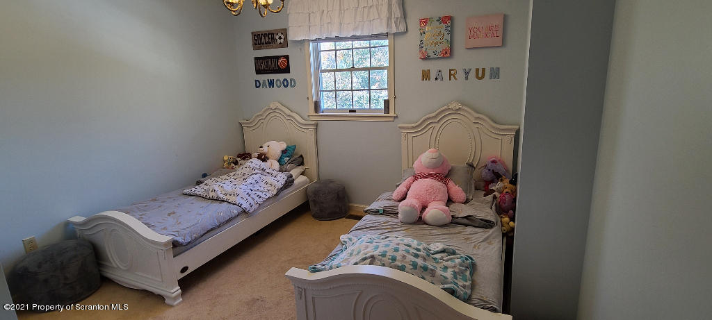 129 Bald Mountain Road Wilkes Barre, PA 18702 - Photo 33 of 40 a bedroom with bed and a window
