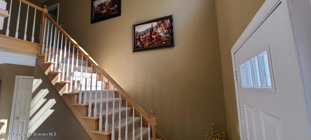 129 Bald Mountain Road Wilkes Barre, PA 18702 - Photo 7 of 40 a view of staircase with wooden floor and white walls