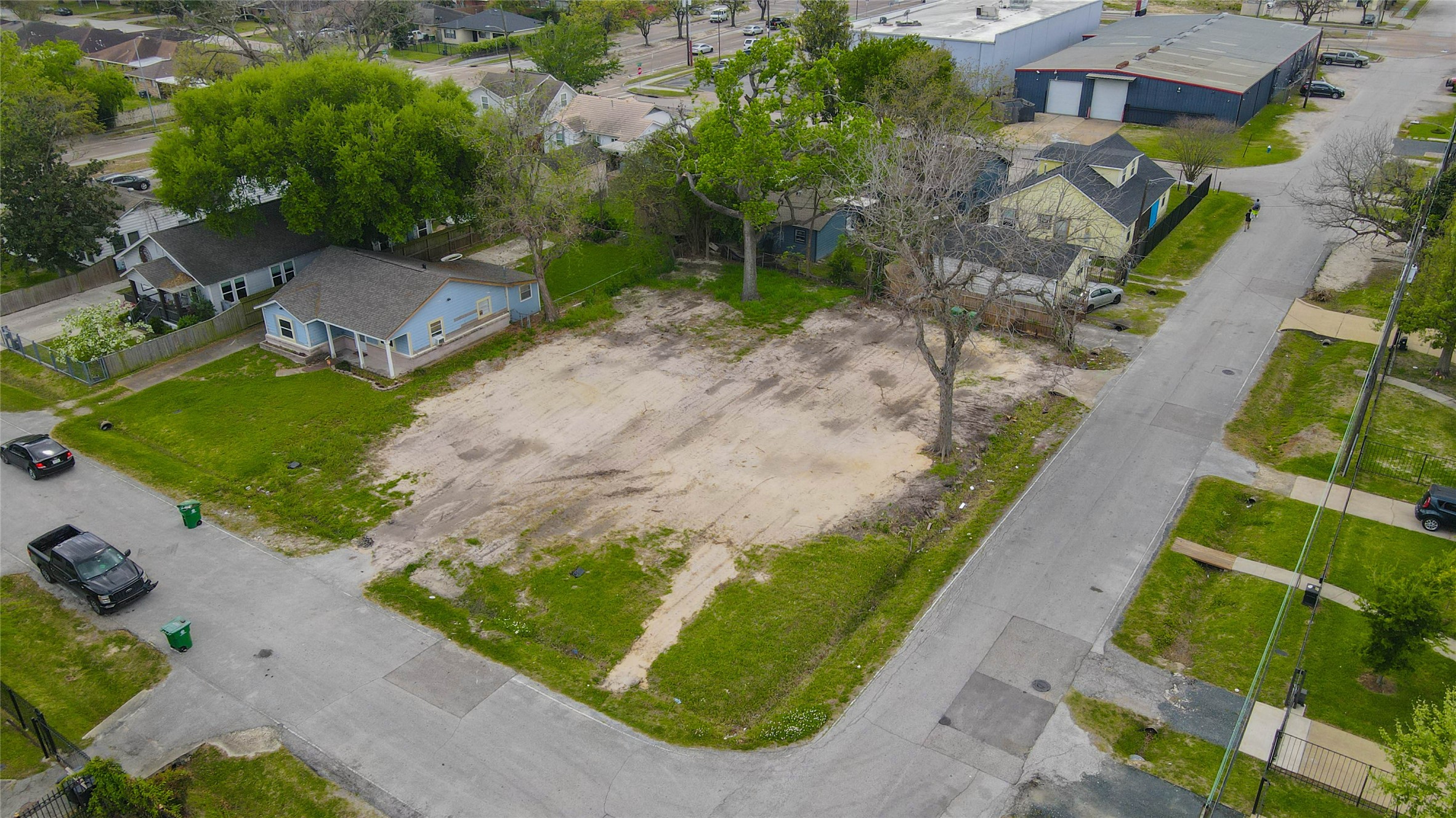 4815 Cetti Street Houston, TX 77009 - Photo 17 of 28 an aerial view of a house with a yard and lake view