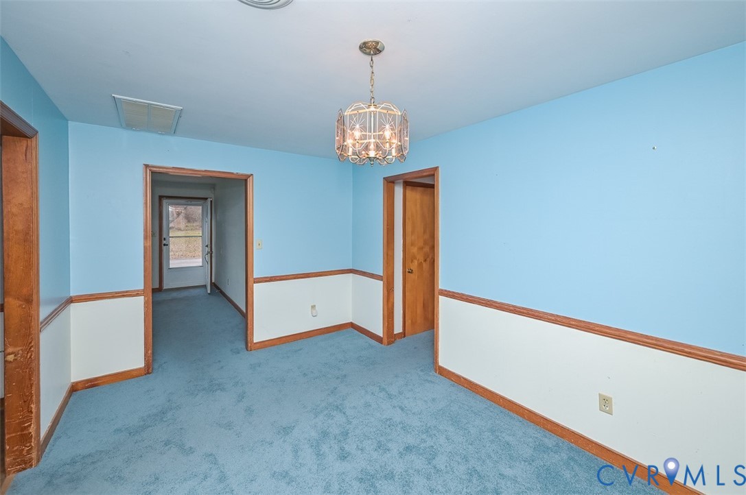 1629 New Market Road Henrico, VA 23231 - Photo 16 of 49 a view of an empty room with a window