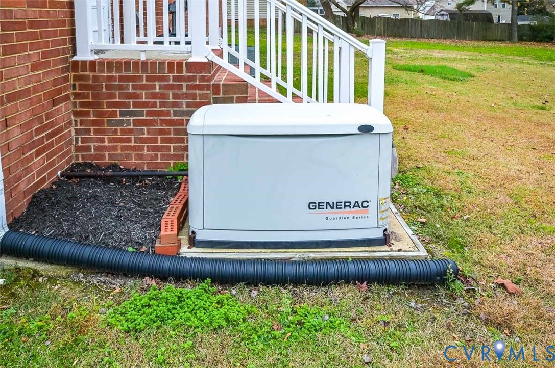 1629 New Market Road Henrico, VA 23231 - Photo 43 of 49 a view of a back yard of the house with a fountain