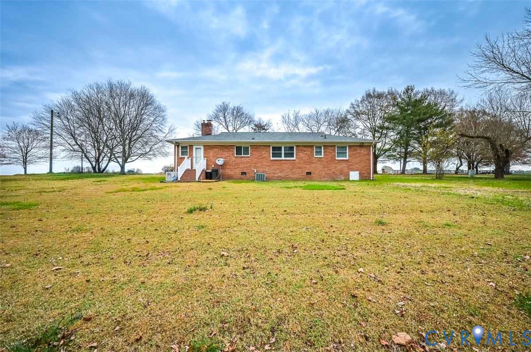 1629 New Market Road Henrico, VA 23231 - Photo 49 of 49 a view of a house with a big yard and large trees