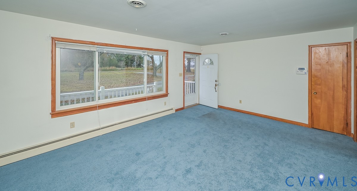 1629 New Market Road Henrico, VA 23231 - Photo 8 of 49 an empty room with windows