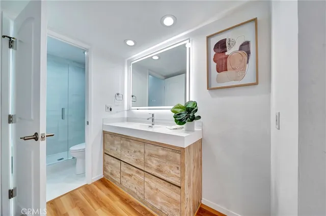 a bathroom with a shower and a toilet