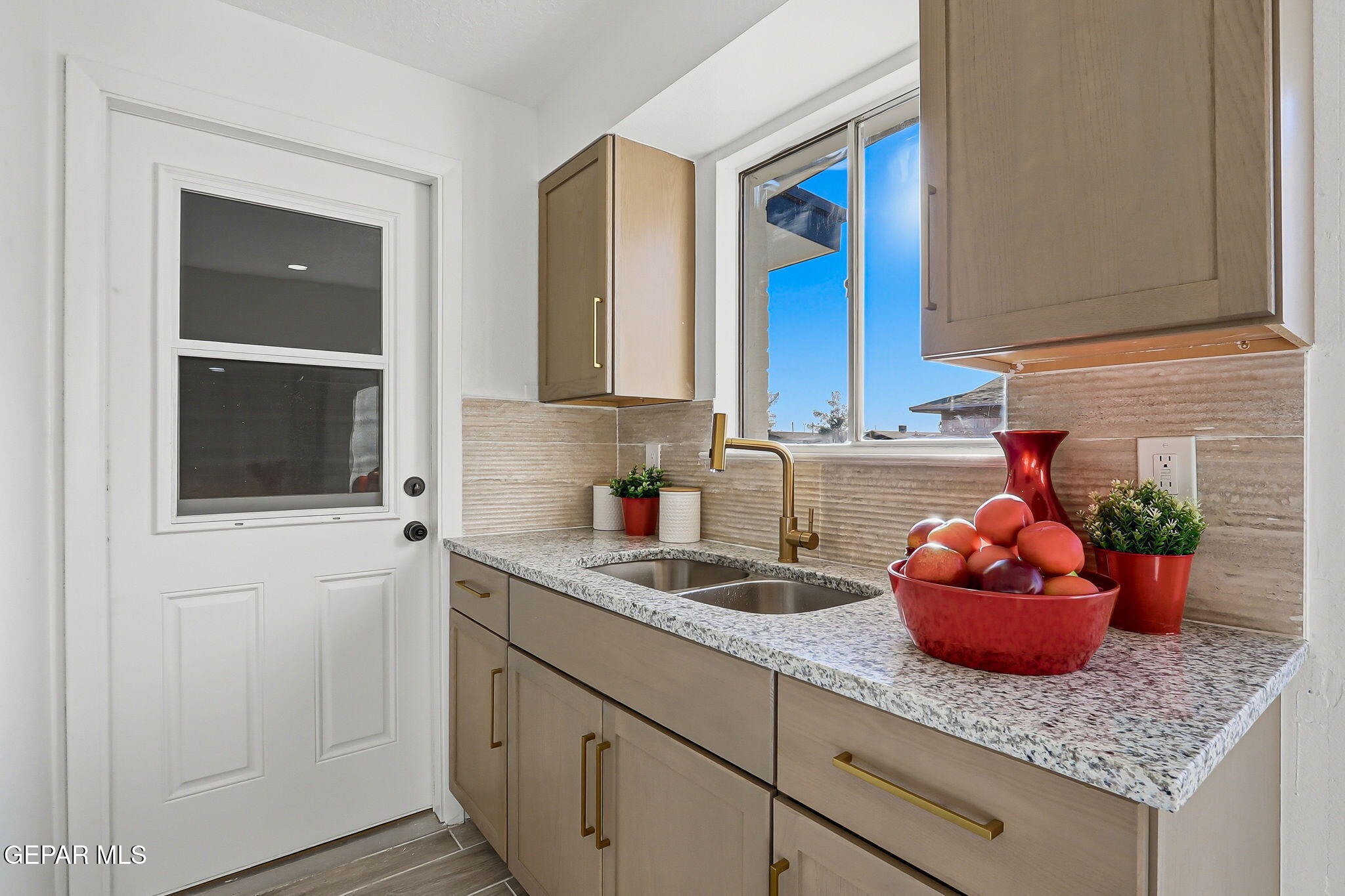 113 West Point Drive El Paso, TX 79907 - Photo 13 of 40 a kitchen with a sink and cabinets