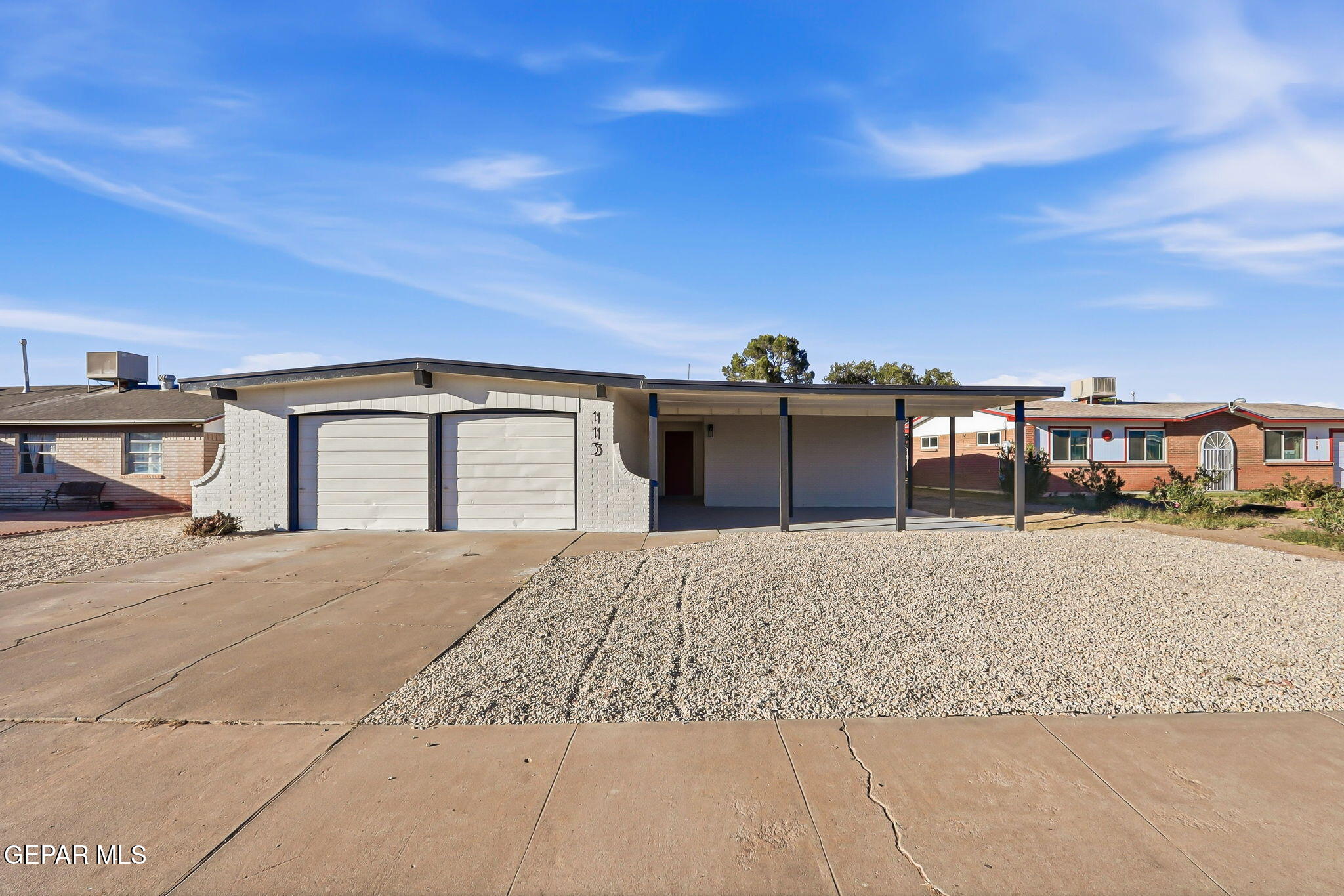 113 West Point Drive El Paso, TX 79907 - Photo 2 of 40 a front view of a house with a yard and sitting area