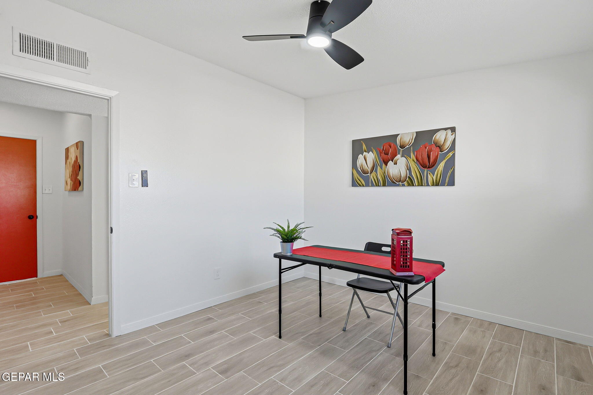 113 West Point Drive El Paso, TX 79907 - Photo 33 of 40 a view of a workspace with furniture and wooden floor