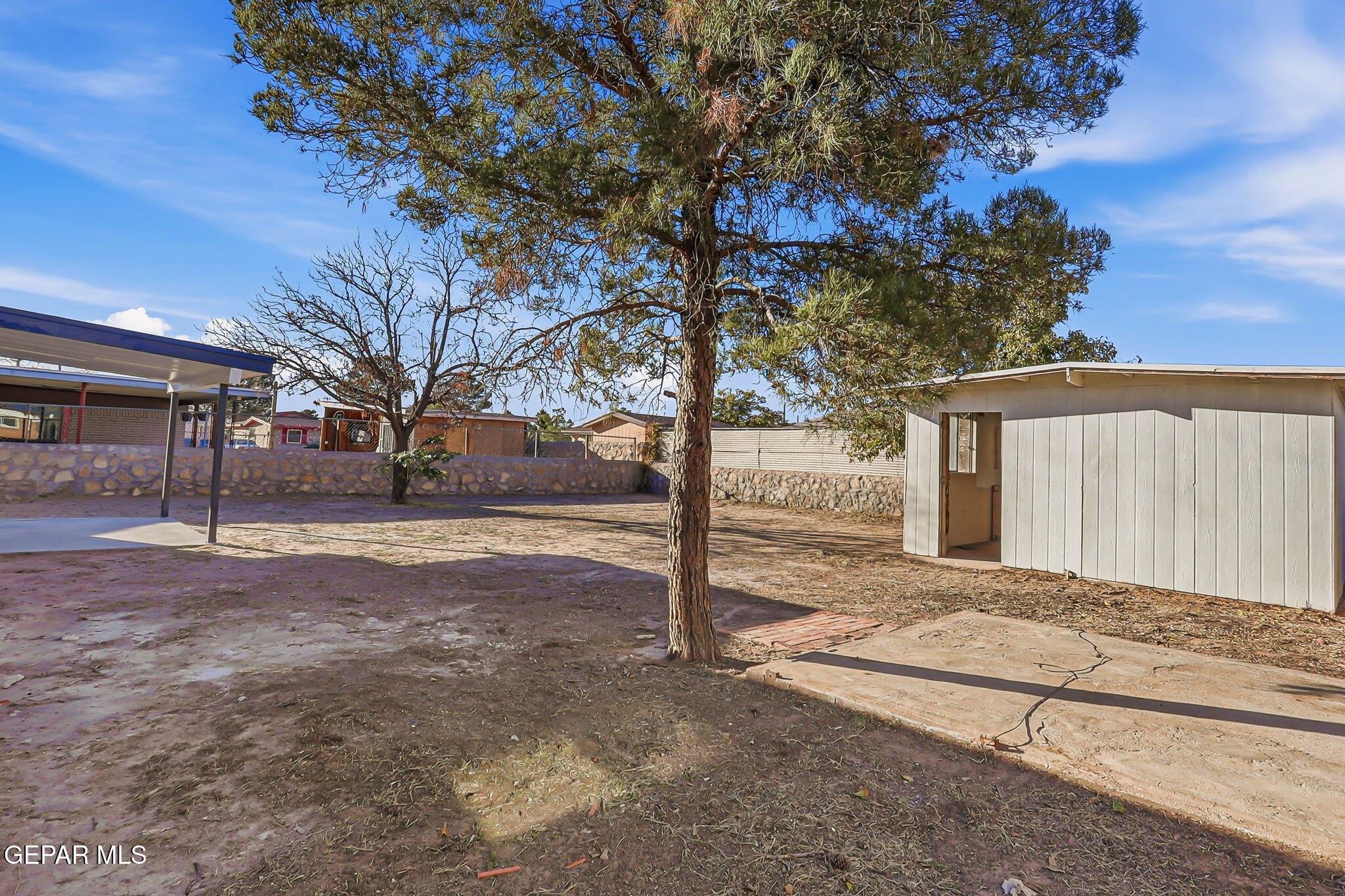 113 West Point Drive El Paso, TX 79907 - Photo 34 of 40 a view of a house with snow on the road
