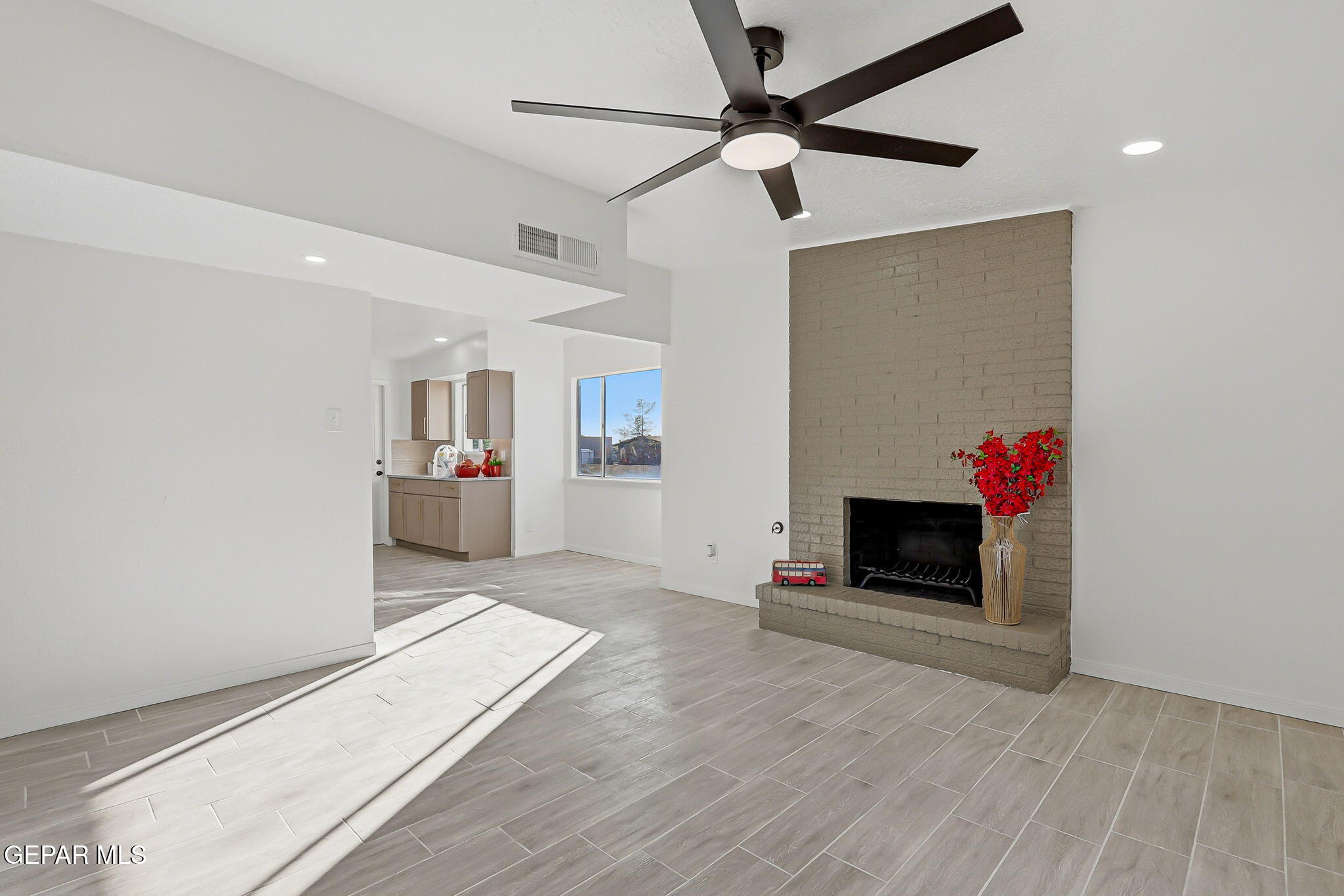 113 West Point Drive El Paso, TX 79907 - Photo 9 of 40 a living room with furniture and a fireplace
