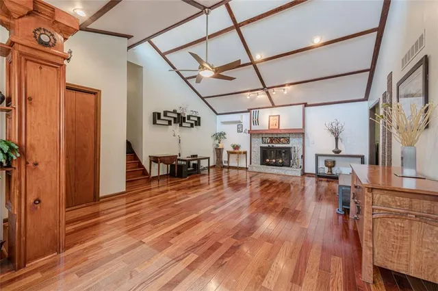 a view of a livingroom with furniture and a chandelier