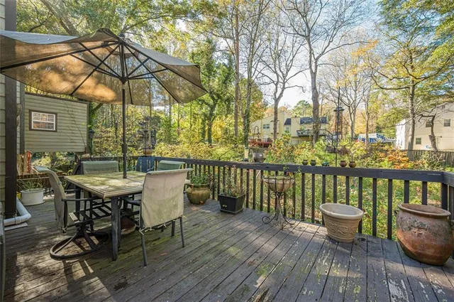 a view of a chairs on the roof deck