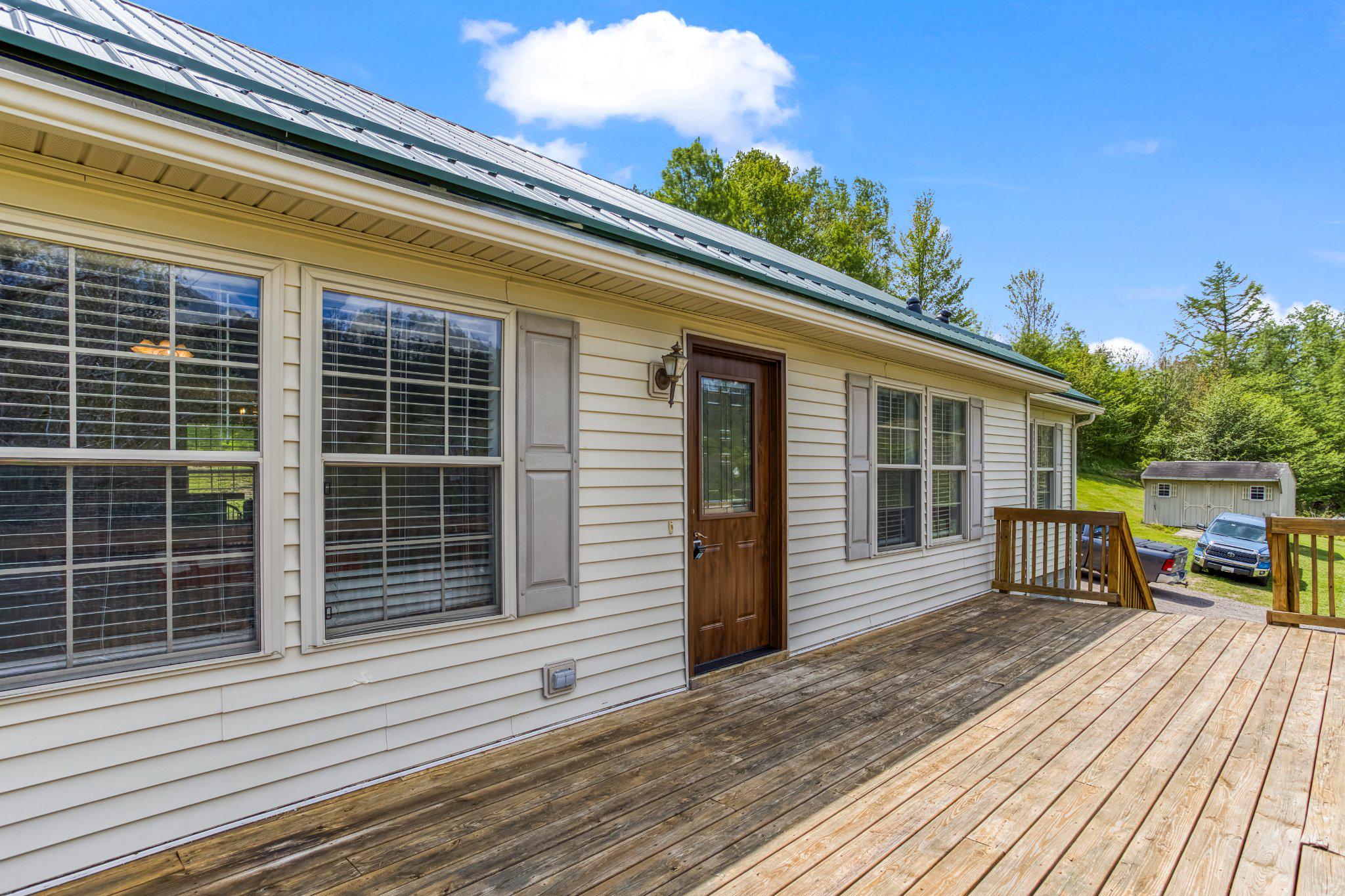 99 Wilt Road Grantsville, MD 21536 - Photo 34 of 56 Charming home with a spacious front deck.