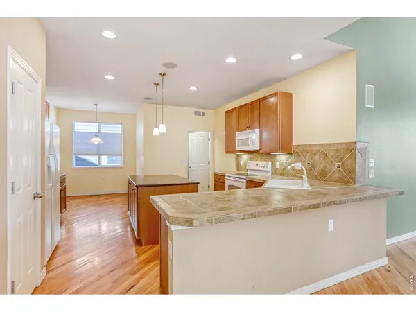 $647,000 | 527 Deerwood Drive, Longmont, CO 80504