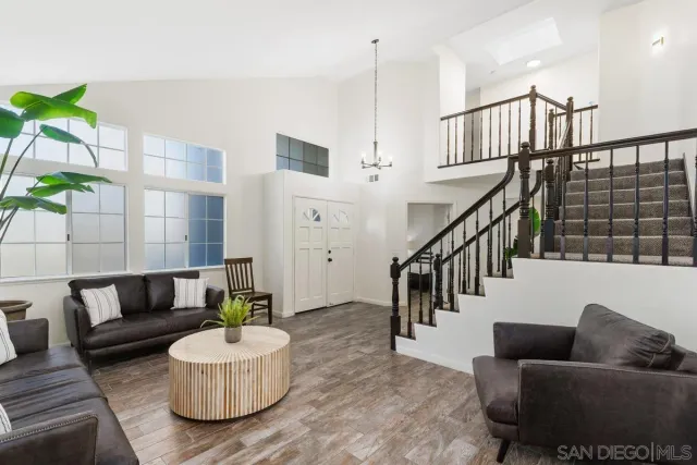 a view of entryway livingroom and hall