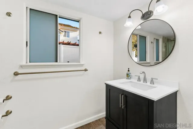 a bathroom with a shower and toilet