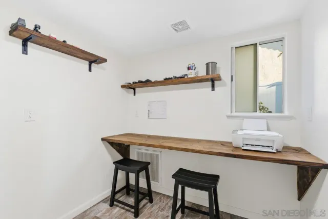 a bedroom with a bed and a closet