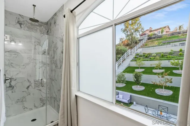 a bedroom with a bed and a table