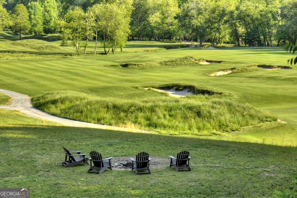 112 Fawn Way Mineral Bluff, GA 30559 - Photo 19 of 26 a view of a golf course with a lake