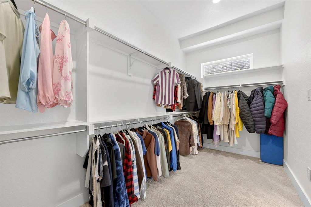 1314 Yellow Pne Road Celina, TX 75009 - Photo 25 of 40 a view of walk in closet with clothes