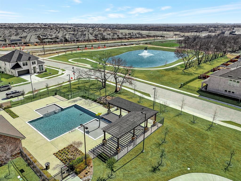 1314 Yellow Pne Road Celina, TX 75009 - Photo 40 of 40 a view of a swimming pool with a lounge chairs