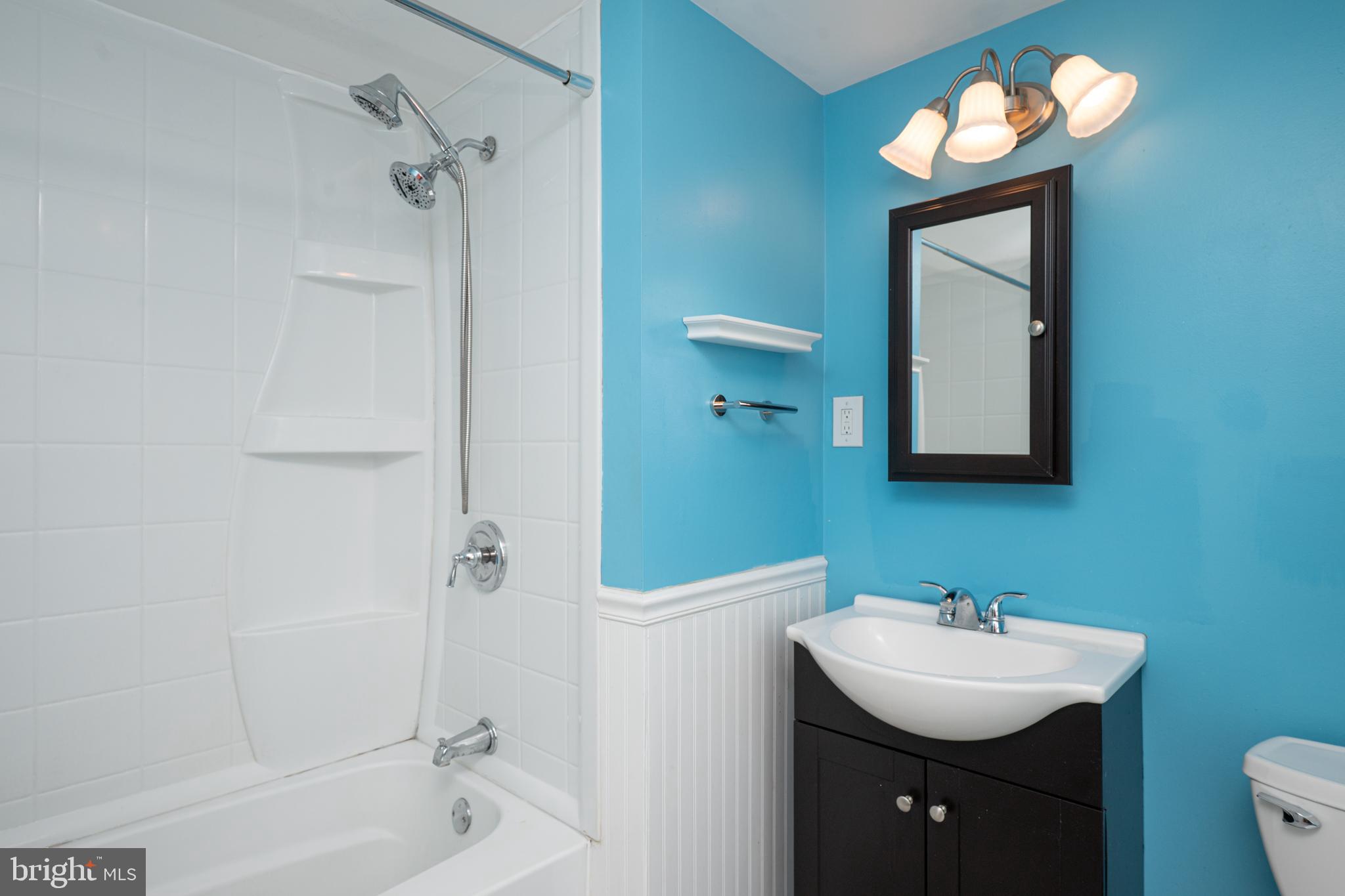 308 Summer St Road Royersford, PA 19468 - Photo 12 of 25 a bathroom with a sink toilet and shower