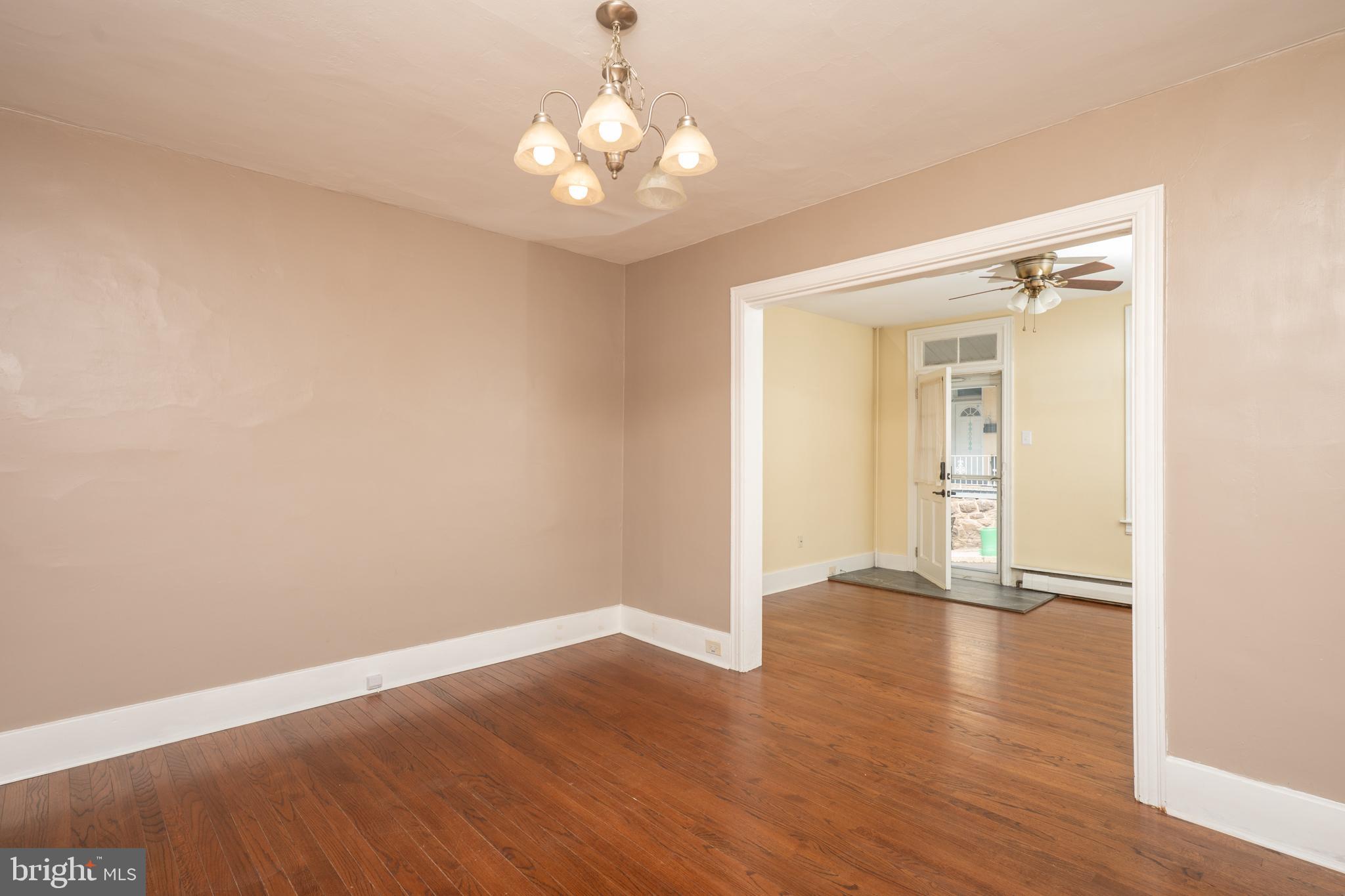 308 Summer St Road Royersford, PA 19468 - Photo 4 of 25 a view of an empty room with wooden floor