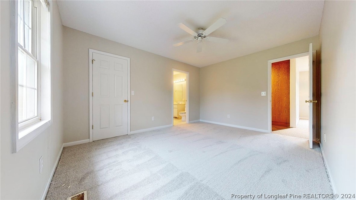 1340 Roseland Road Aberdeen, NC 28315 - Photo 22 of 39 a view of an empty room with a window