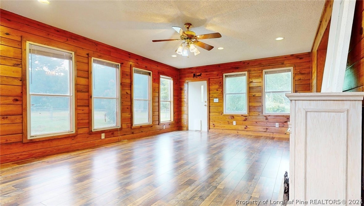 1340 Roseland Road Aberdeen, NC 28315 - Photo 31 of 39 a view of an entryway with wooden floor
