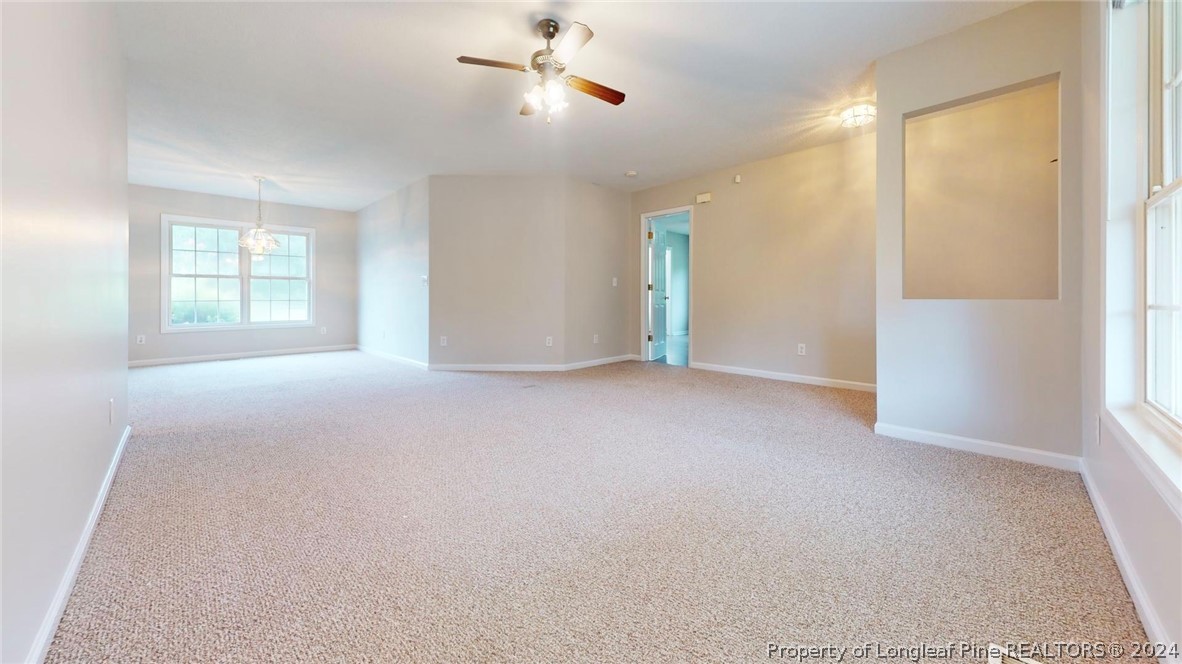 1340 Roseland Road Aberdeen, NC 28315 - Photo 6 of 39 a view of an empty room with a window