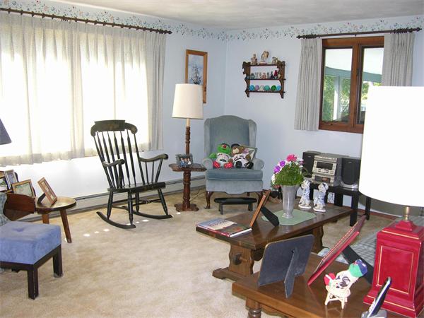 4 Farnum Road Bourne, MA 02532 - Photo 3 of 14 a work room with furniture and a potted plant