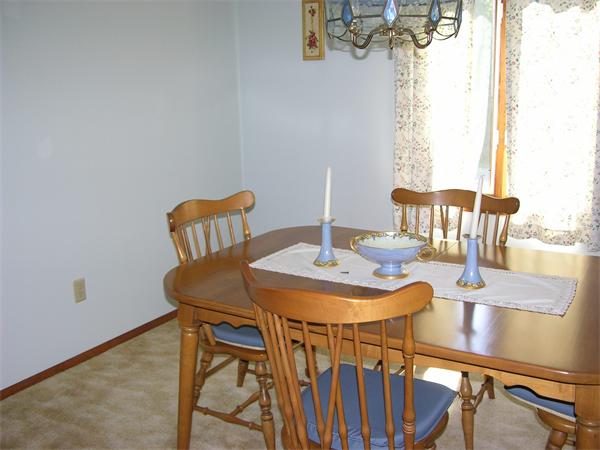 4 Farnum Road Bourne, MA 02532 - Photo 4 of 14 a view of a dining room with furniture and window