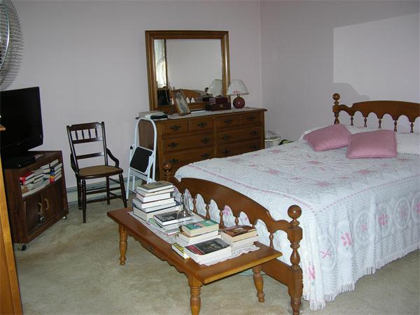4 Farnum Road Bourne, MA 02532 - Photo 8 of 14 a living room with furniture and a wooden floor