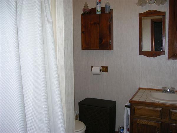 4 Farnum Road Bourne, MA 02532 - Photo 9 of 14 a bathroom with a sink and a mirror