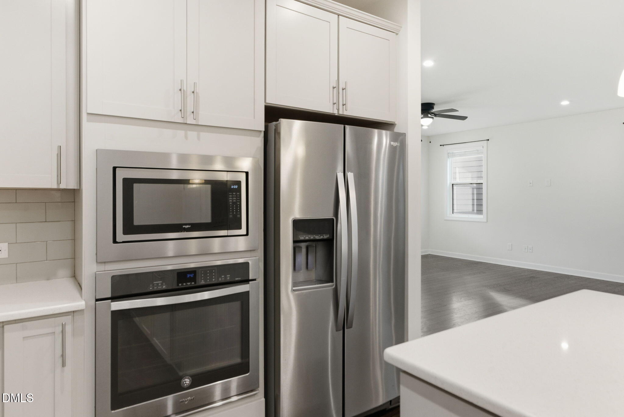 2913 Macbeth Lane Apex, NC 27502 - Photo 19 of 62 a kitchen with appliances and cabinets