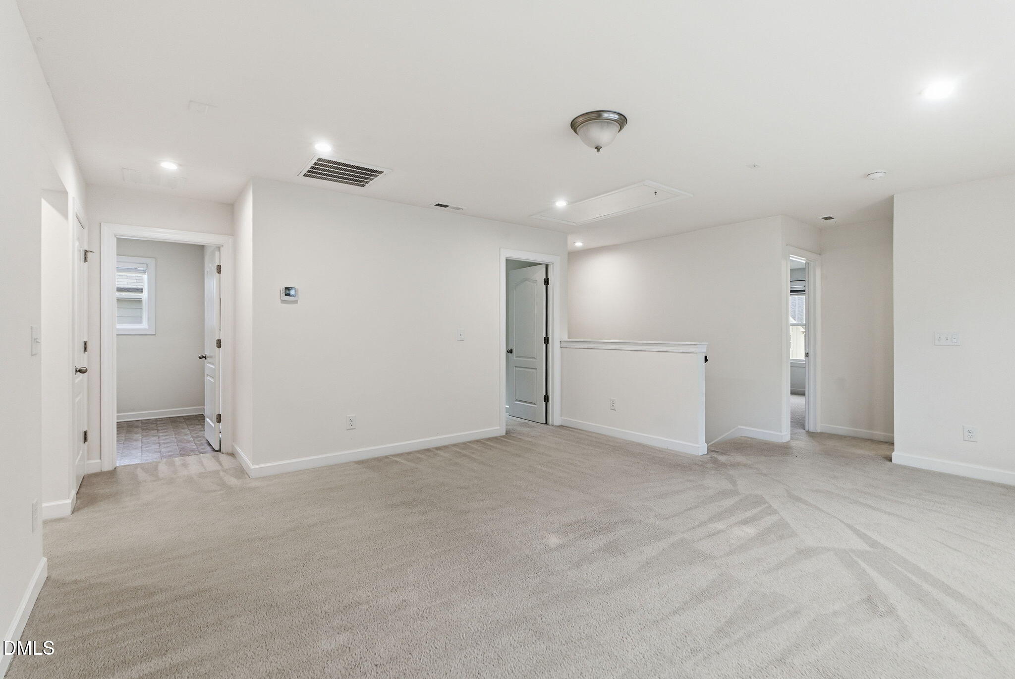 2913 Macbeth Lane Apex, NC 27502 - Photo 31 of 62 a view of an empty room