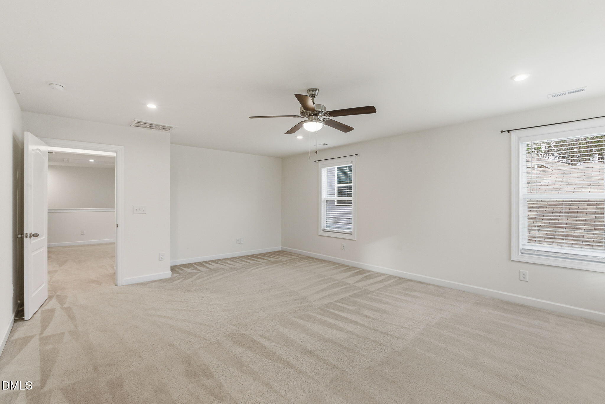 2913 Macbeth Lane Apex, NC 27502 - Photo 40 of 62 a view of an empty room with a window