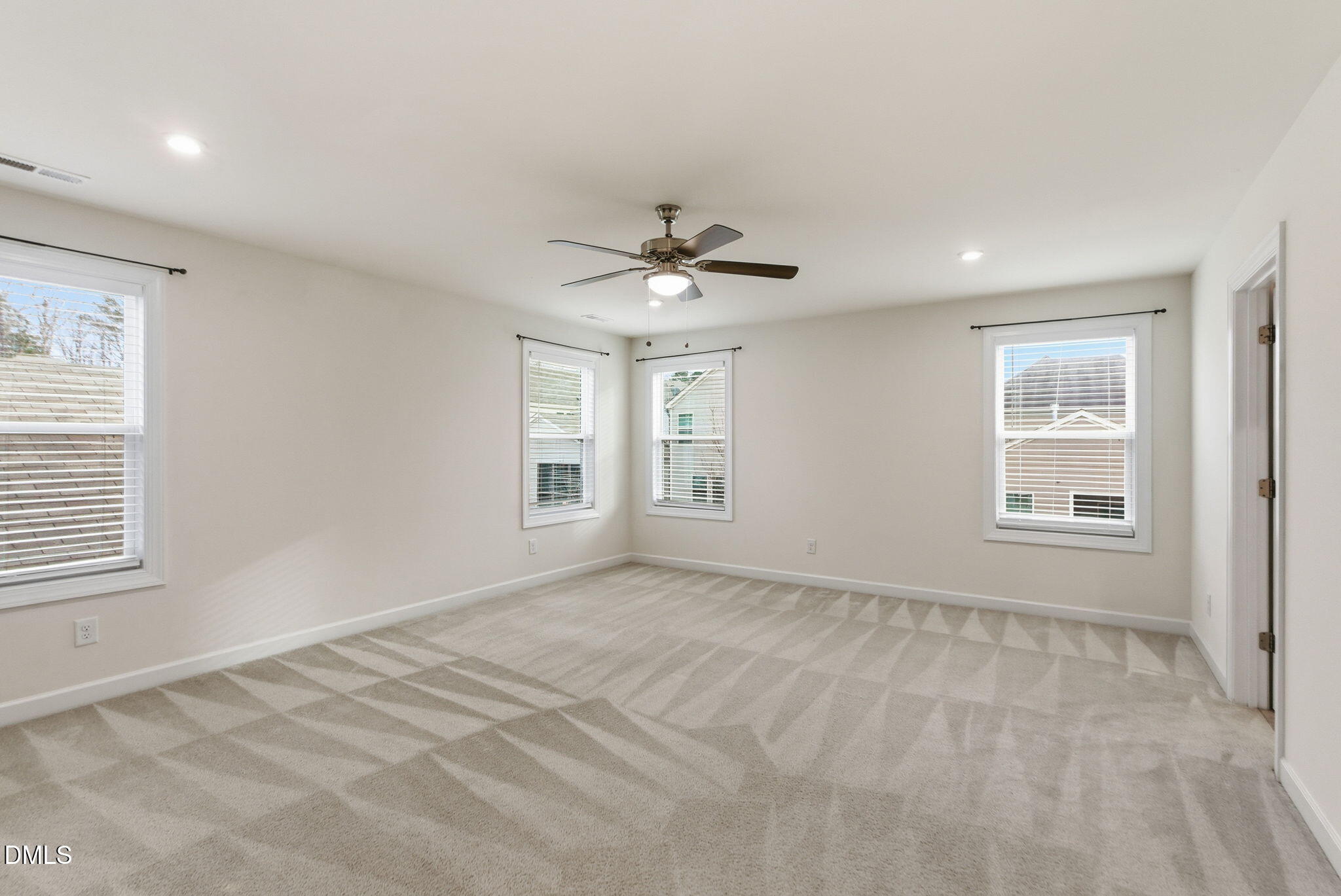 2913 Macbeth Lane Apex, NC 27502 - Photo 42 of 62 a view of an empty room with a window