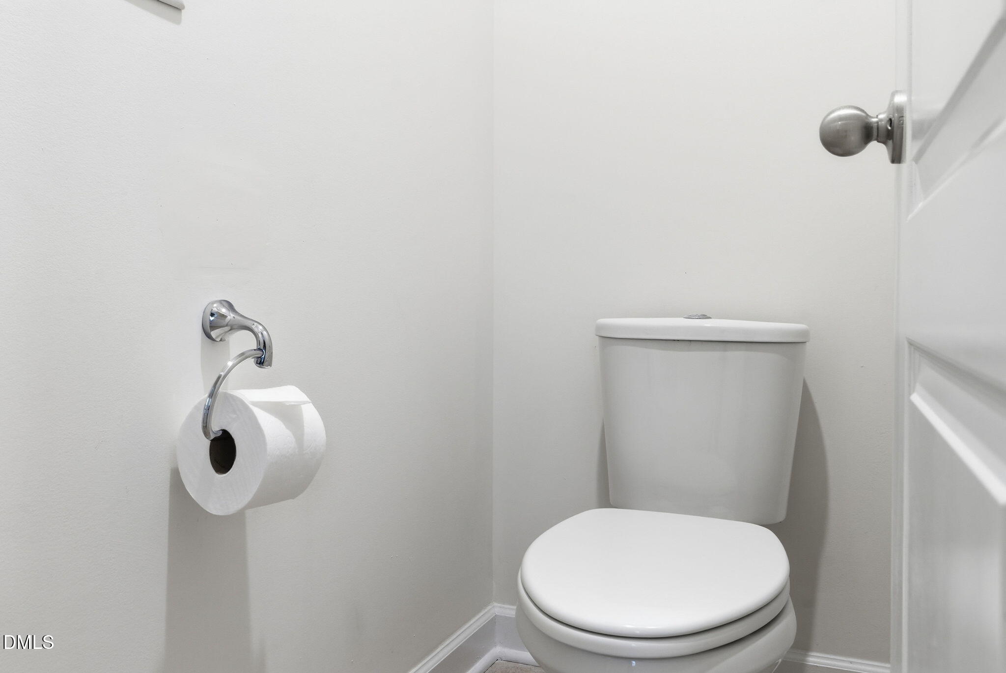 2913 Macbeth Lane Apex, NC 27502 - Photo 49 of 62 a white toilet sitting next to a shower