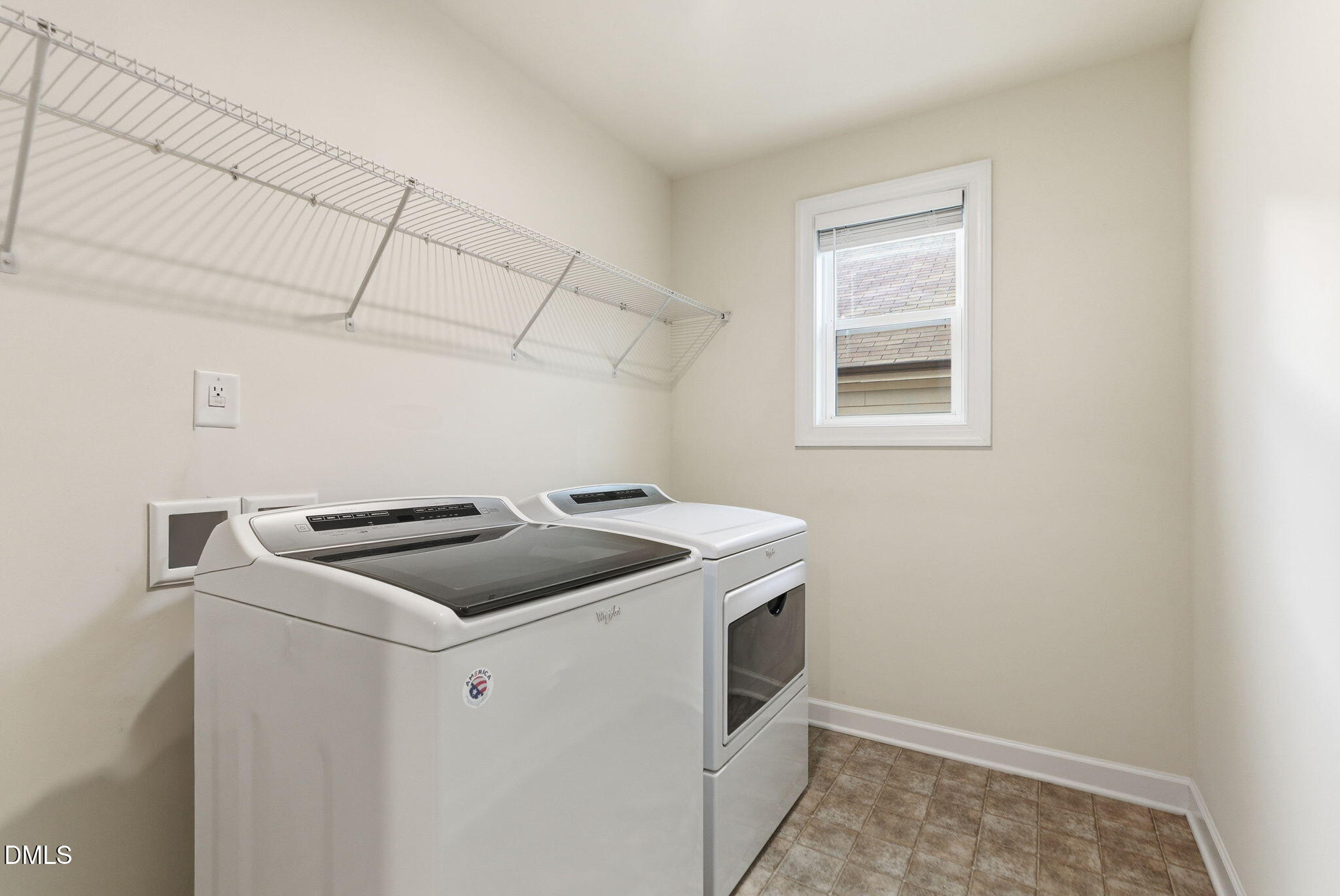 2913 Macbeth Lane Apex, NC 27502 - Photo 53 of 62 a utility room with dryer and washer