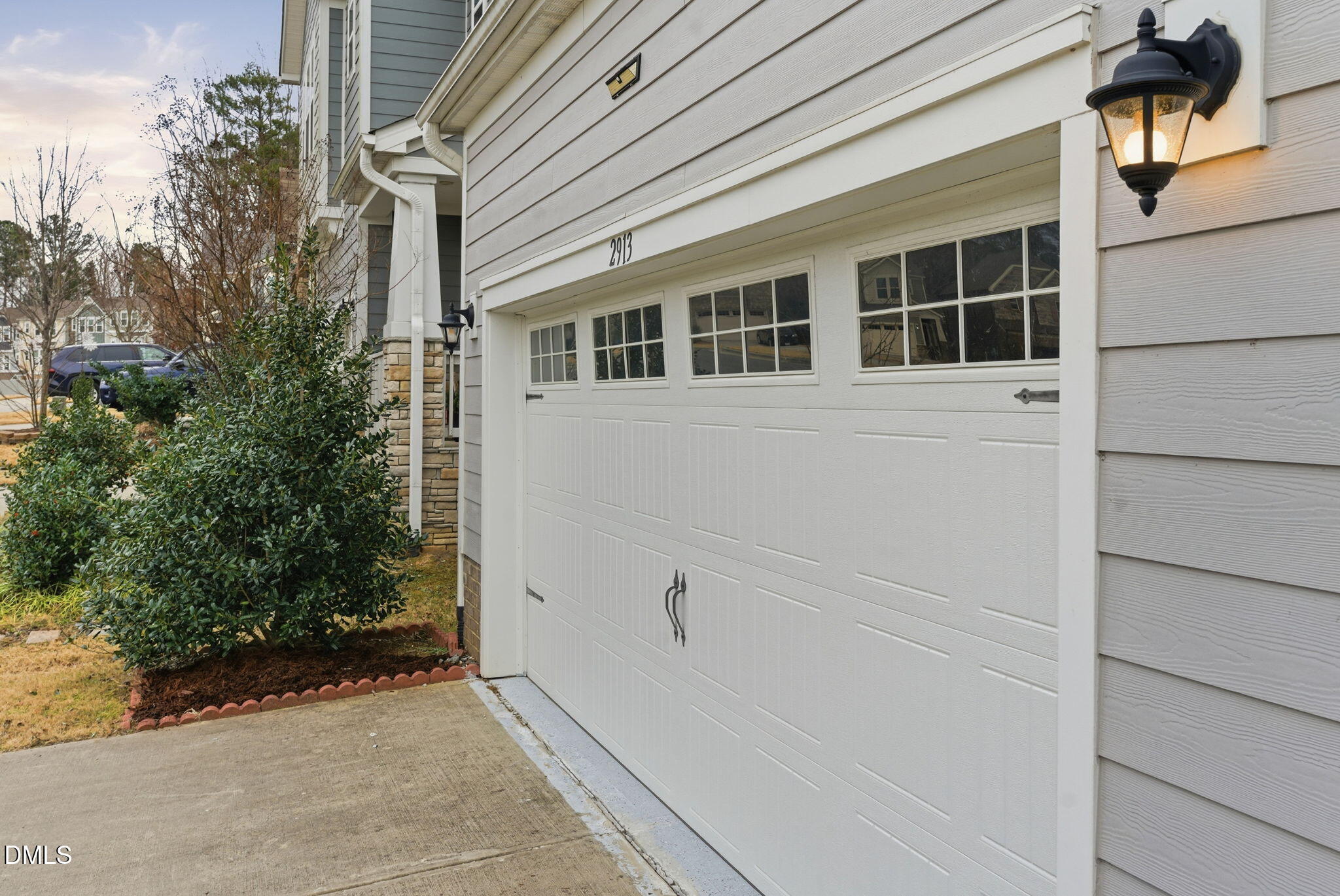 2913 Macbeth Lane Apex, NC 27502 - Photo 4 of 62 a view of house with trees in front