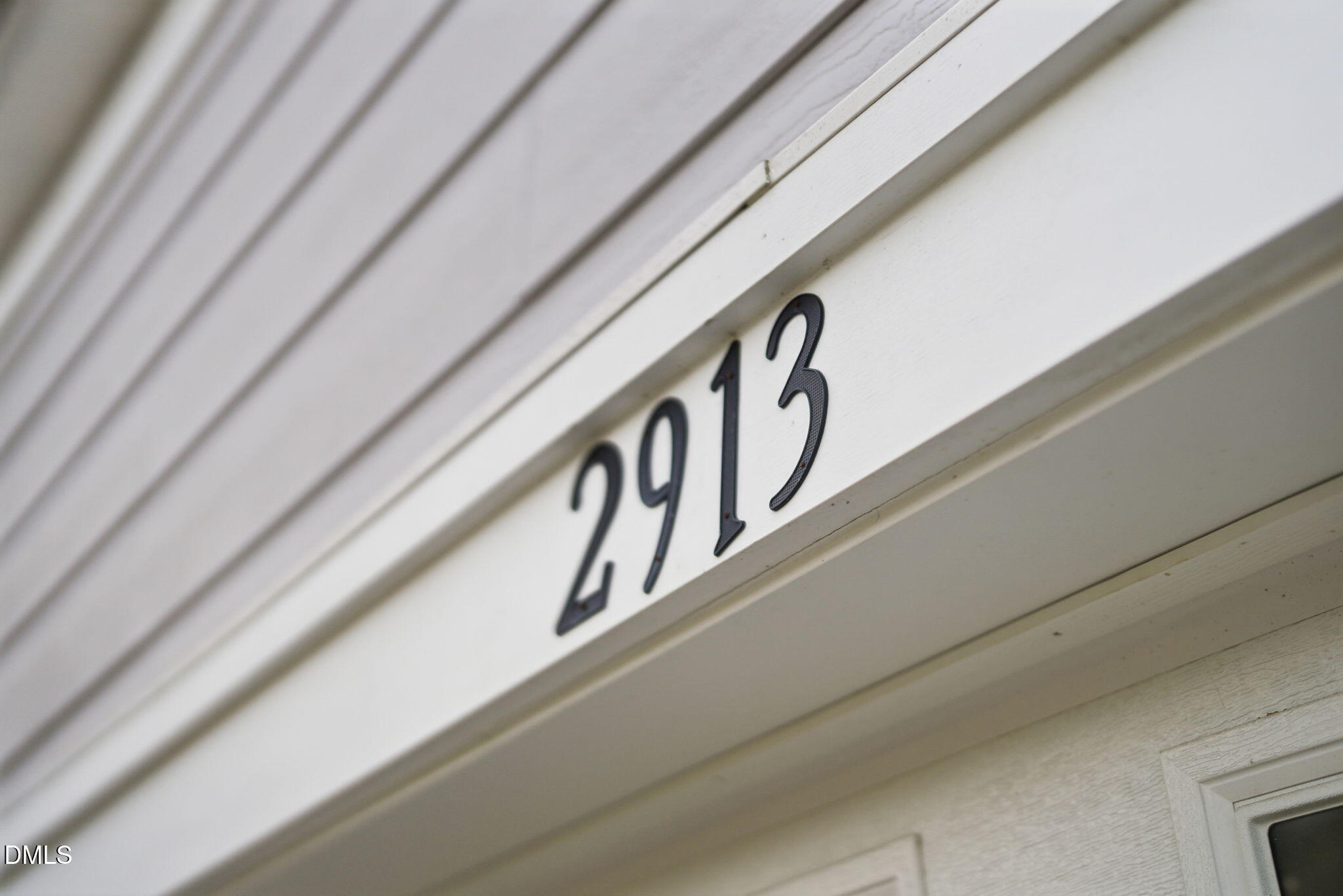 2913 Macbeth Lane Apex, NC 27502 - Photo 5 of 62 a close up of a street sign