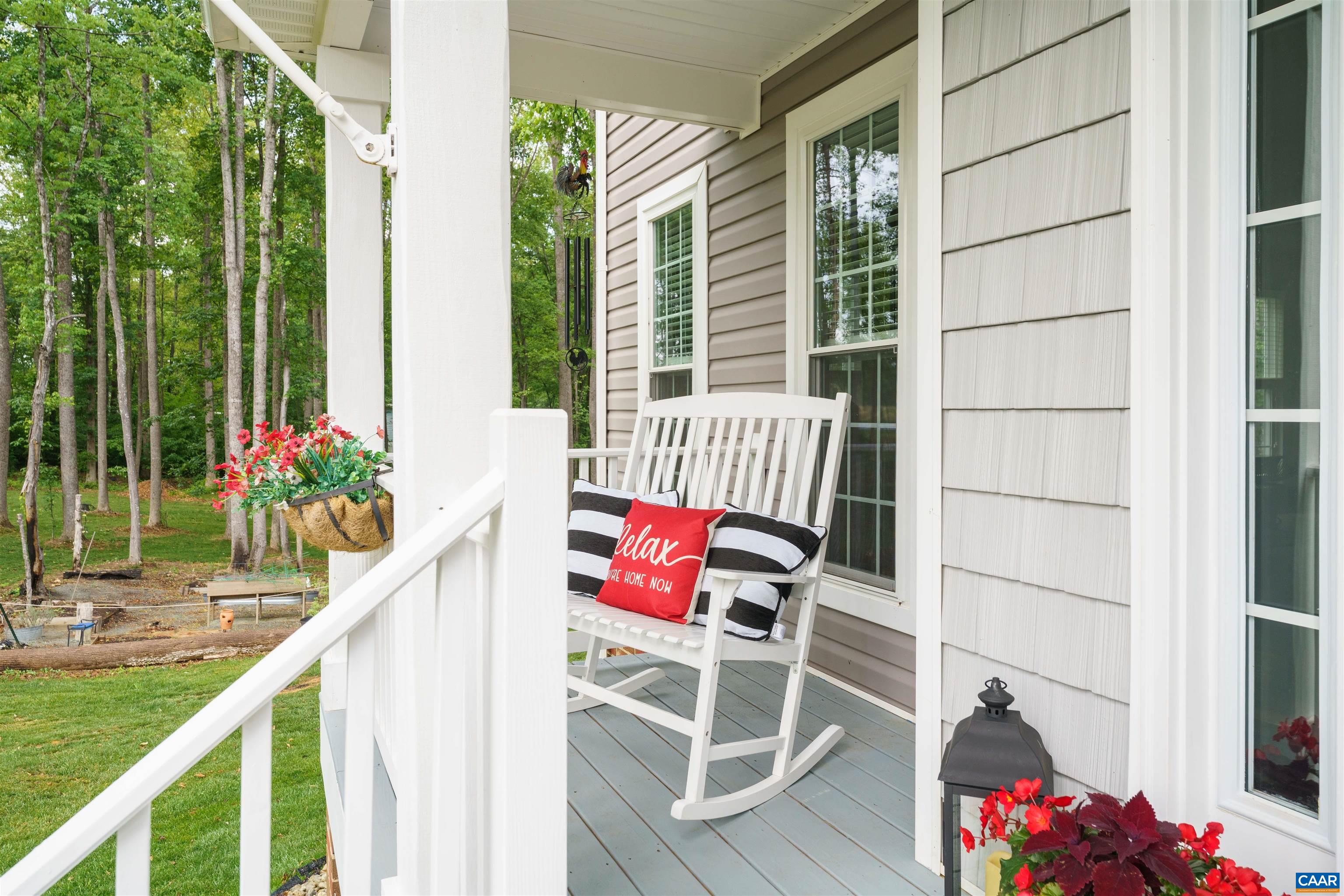 1760 Haden Martin Road Palmyra, VA 22963 - Photo 12 of 51 a balcony with couple of flower plants