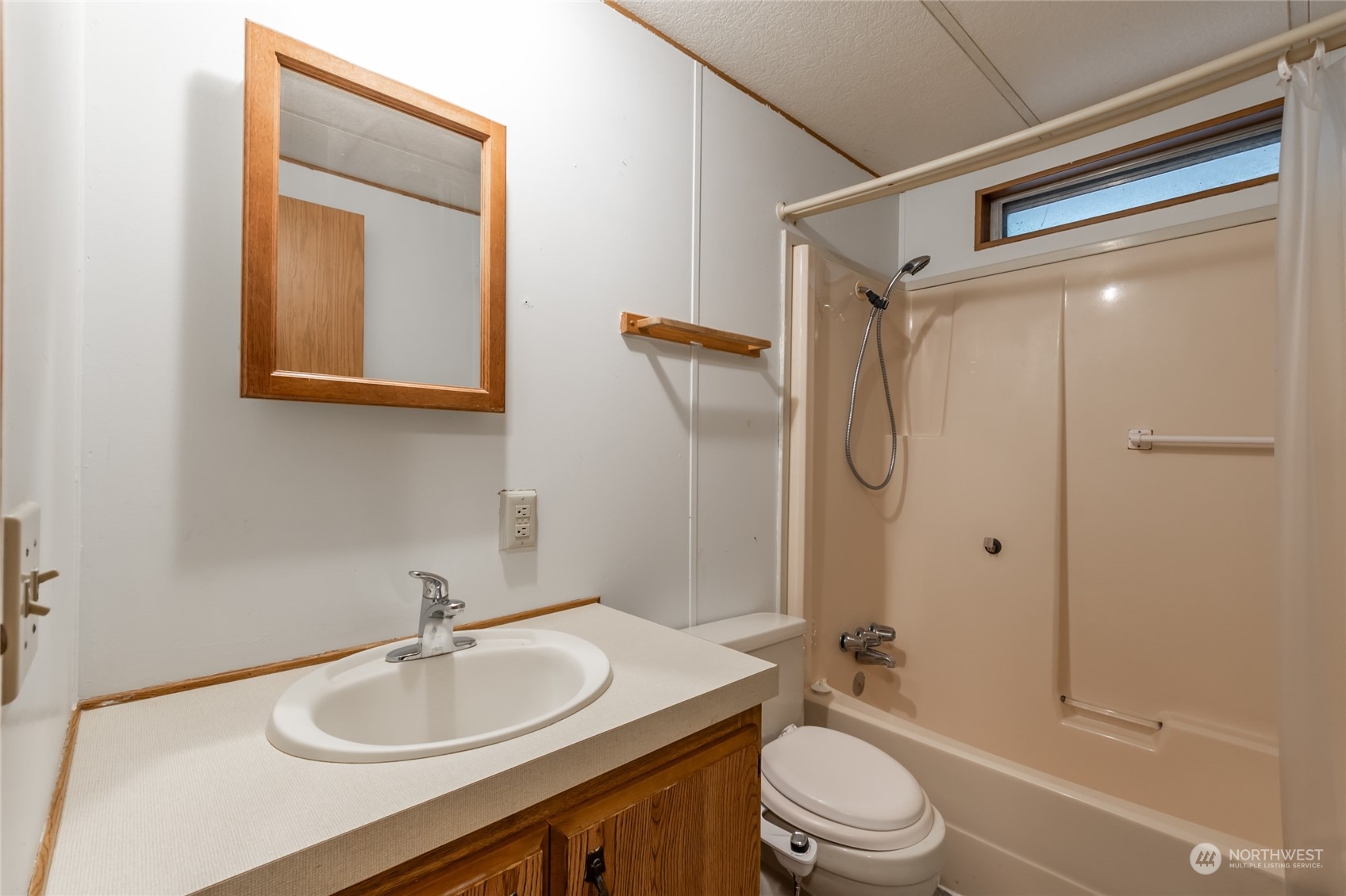 1554 East Roy Road Freeland, WA 98249 - Photo 17 of 24 a bathroom with a sink toilet and shower