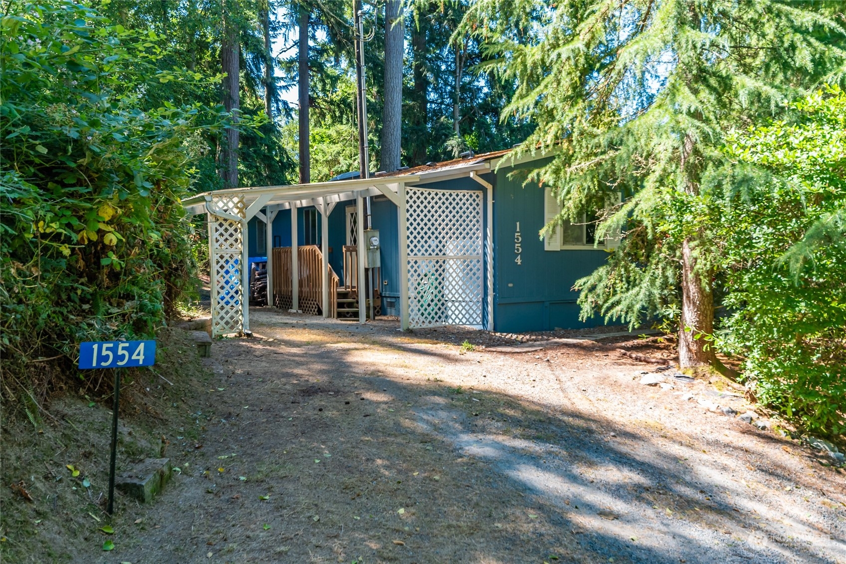 1554 East Roy Road Freeland, WA 98249 - Photo 23 of 24 a view of a house with a backyard