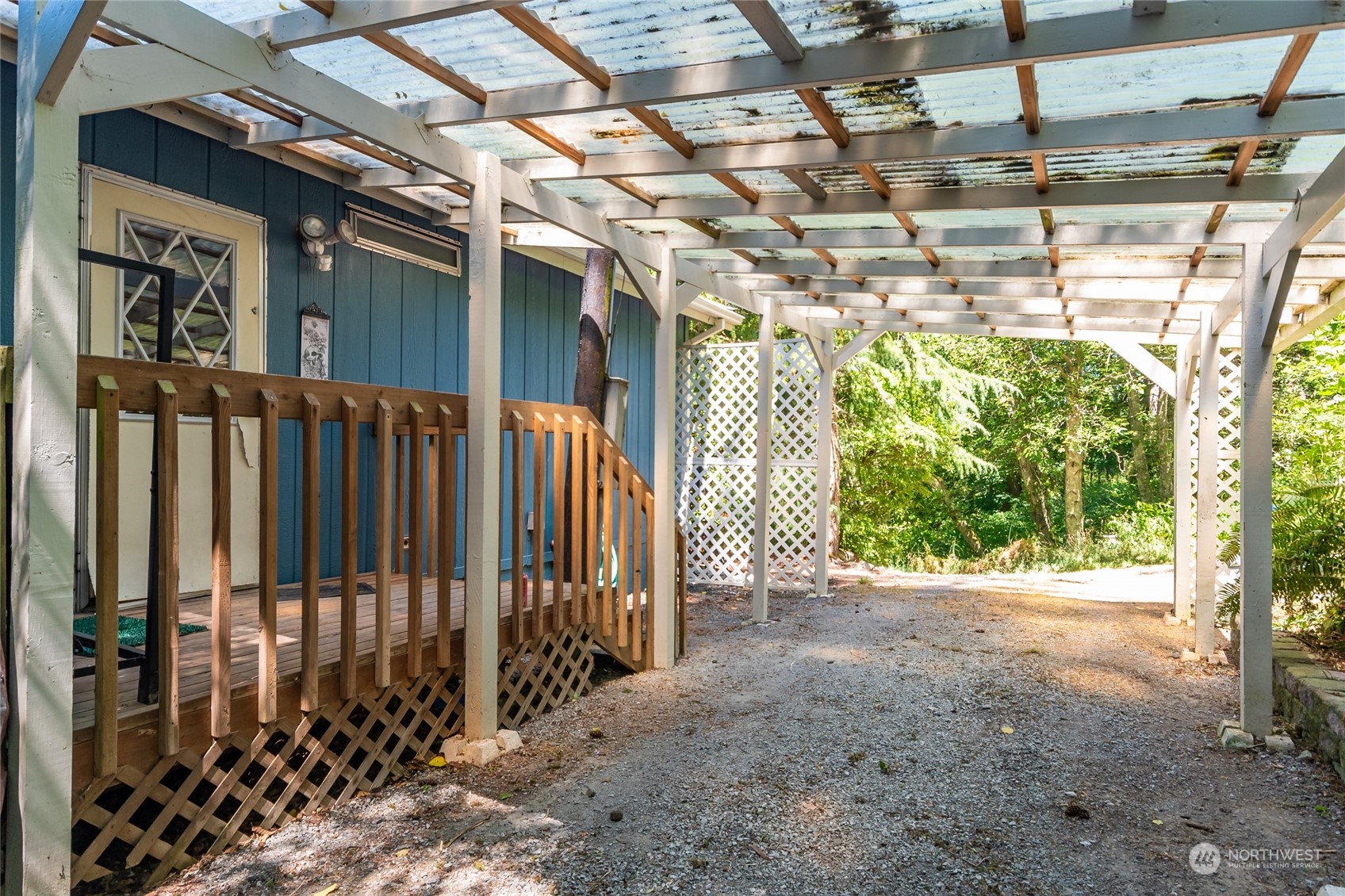 1554 East Roy Road Freeland, WA 98249 - Photo 5 of 24 a view of a porch with wooden fence