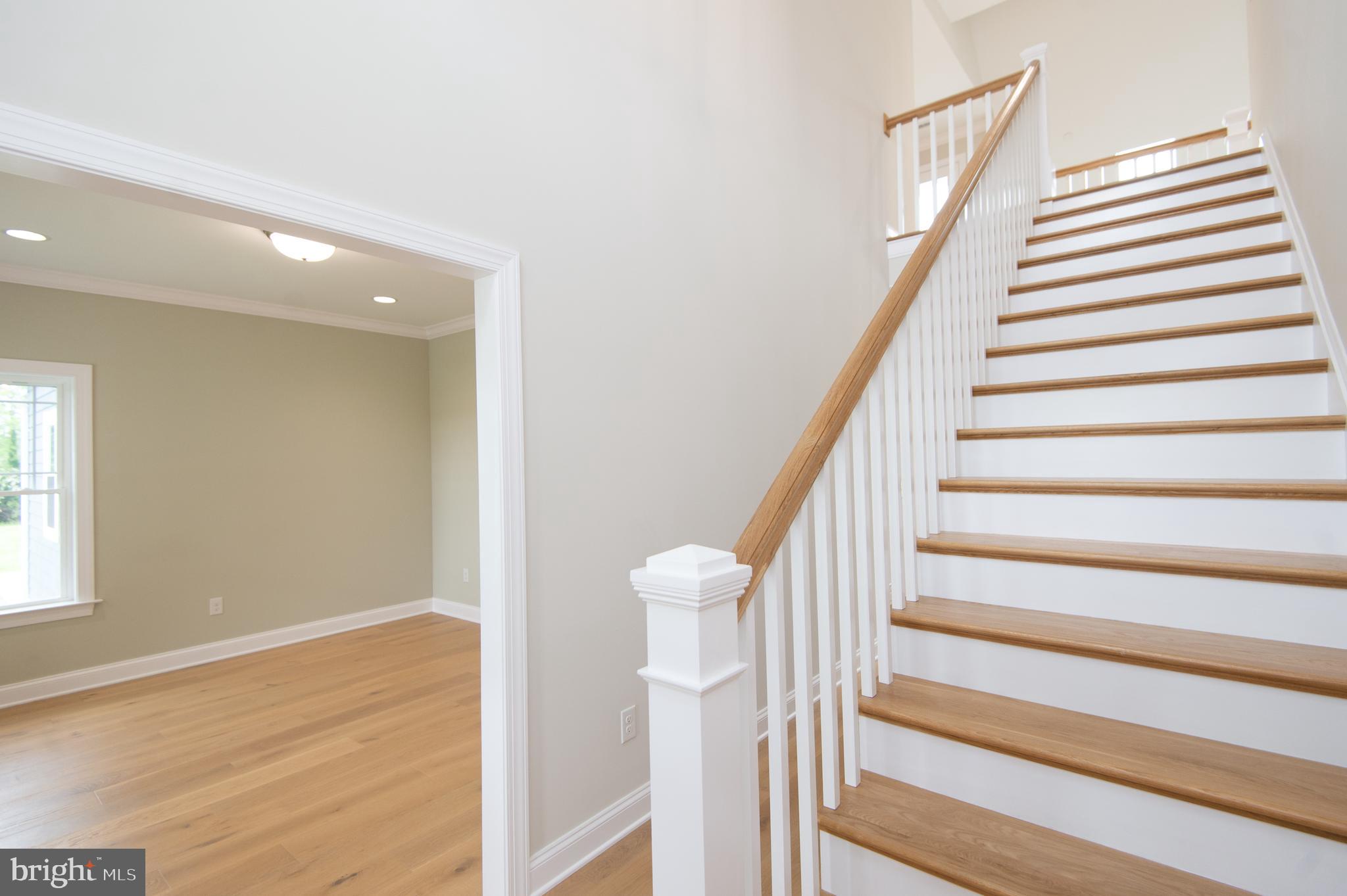 2202 Horns Point Road Cambridge, MD 21613 - Photo 16 of 74 Foyer and staircase